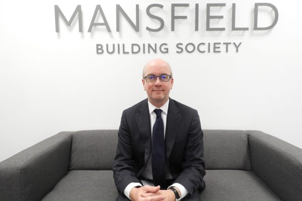 Mansfield Building Society Jim Stevens sitting on sofa